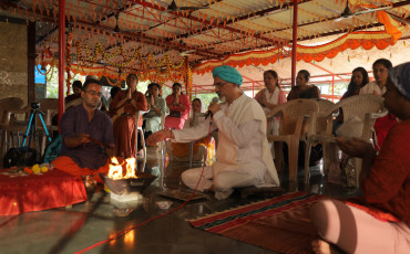 offering to the holy fire, burning karma, pasaydaan event at bodhmarga with vibhushri